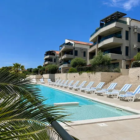 Апартаменты Coastal Escape With Pool *